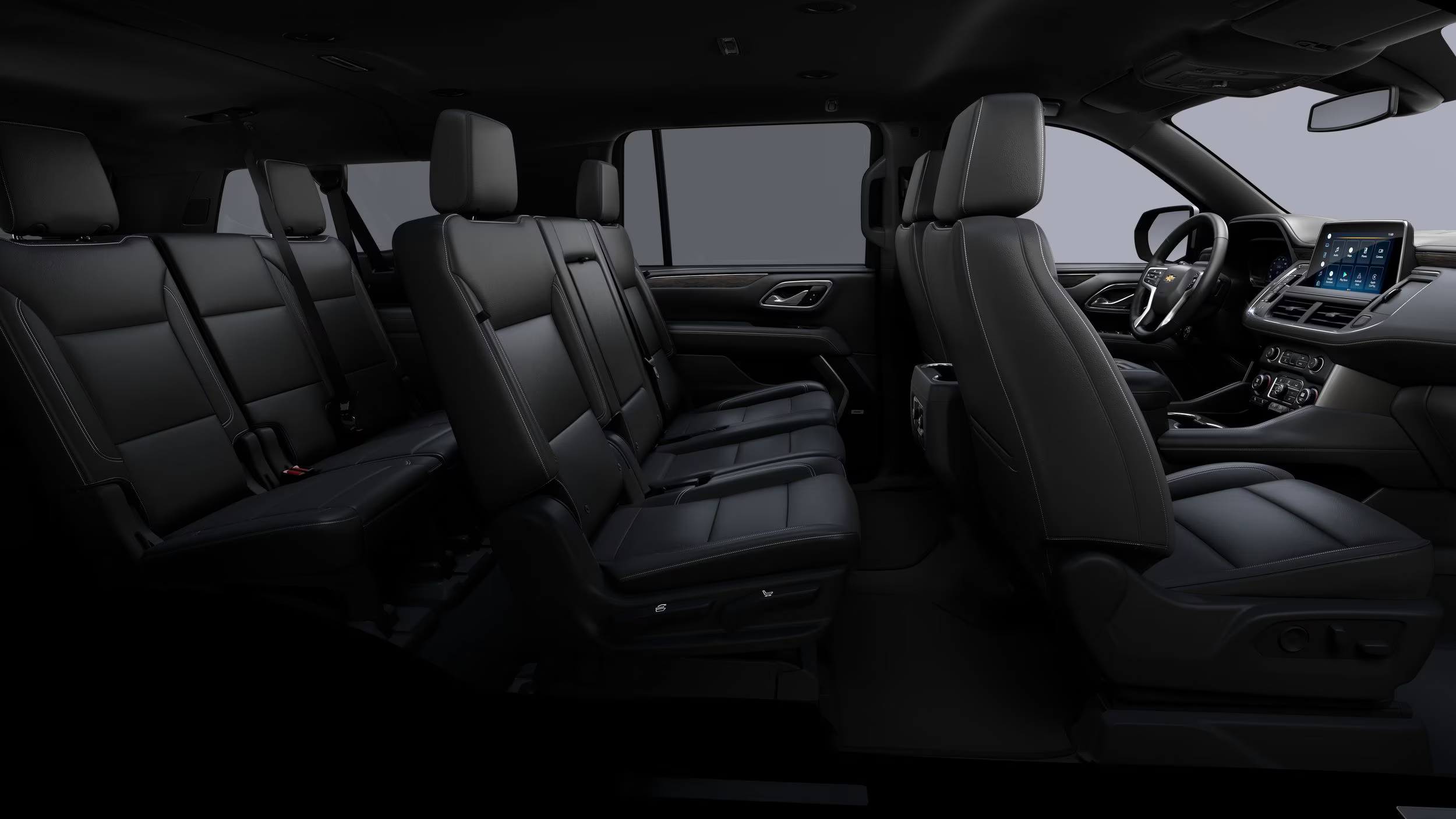 716 Limousine Fleet - gallery image of black car service Suburban SUVs