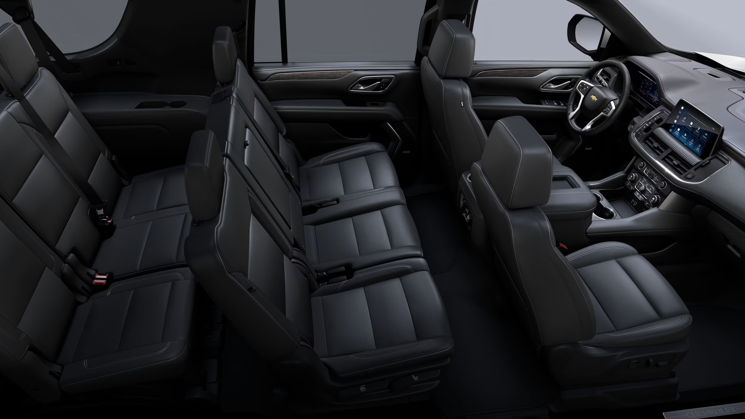 716 Limousine Fleet - gallery image of black car service Suburban SUVs